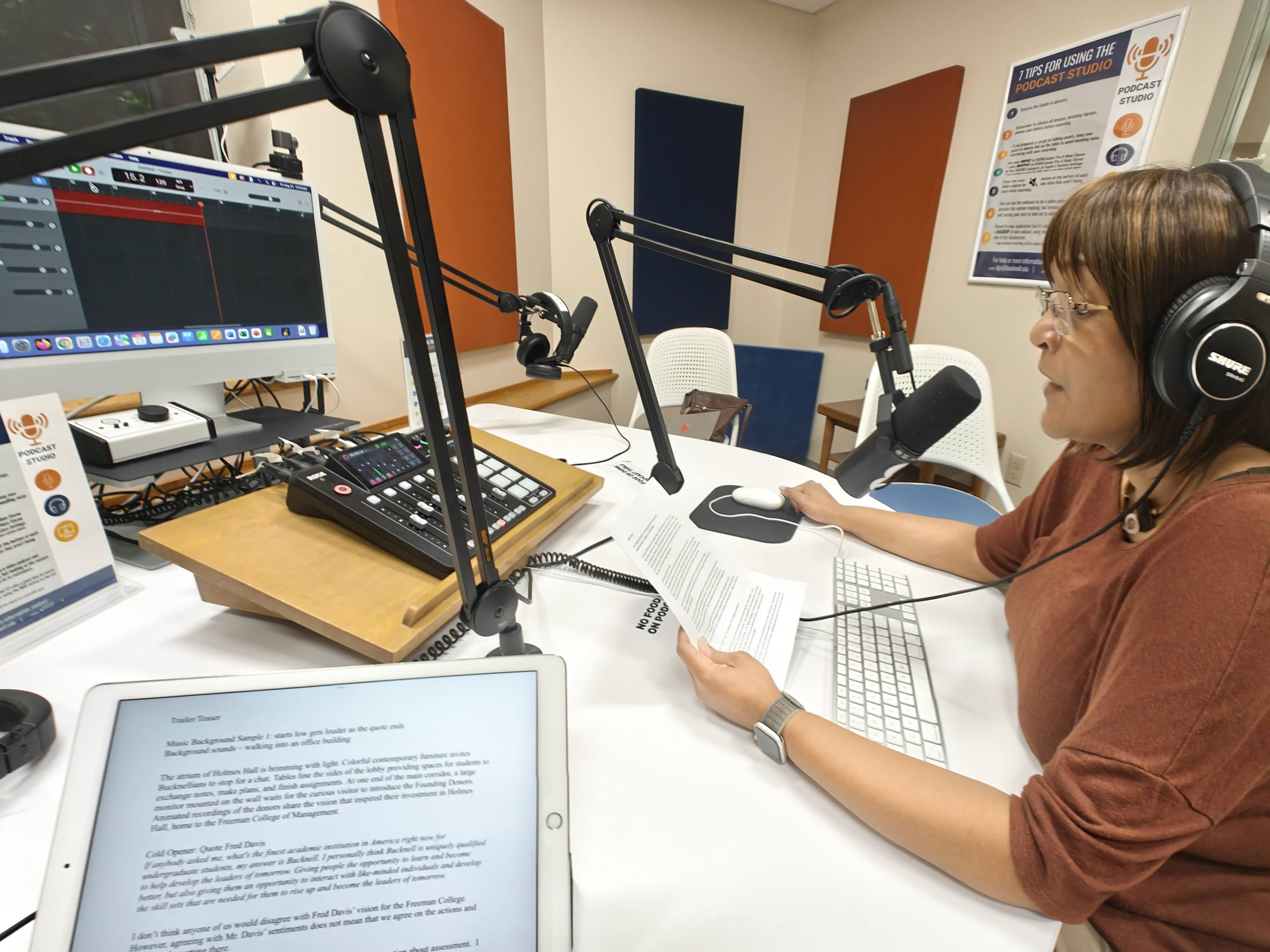 Vanessa Hill editing and recording in the Bertrand Library Podcast Studio.